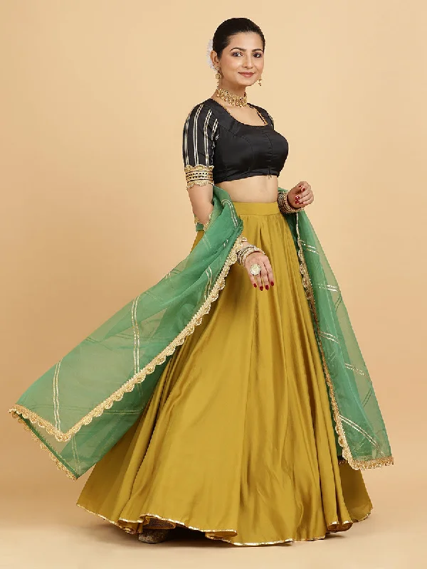 Jhalak Aziza 4-Pc Lehenga Set x Tyohaar | Mustard Lehenga, Charcoal Black Blouse with Emerald Panna Dupatta and Cancan Skirt