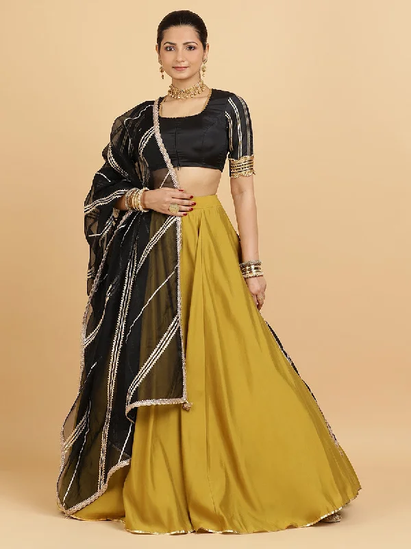 Jhalak Aziza 4-Pc Lehenga Set x Tyohaar | Mustard Lehenga, Charcoal Black Blouse with Chandni Black Dupatta and Cancan Skirt